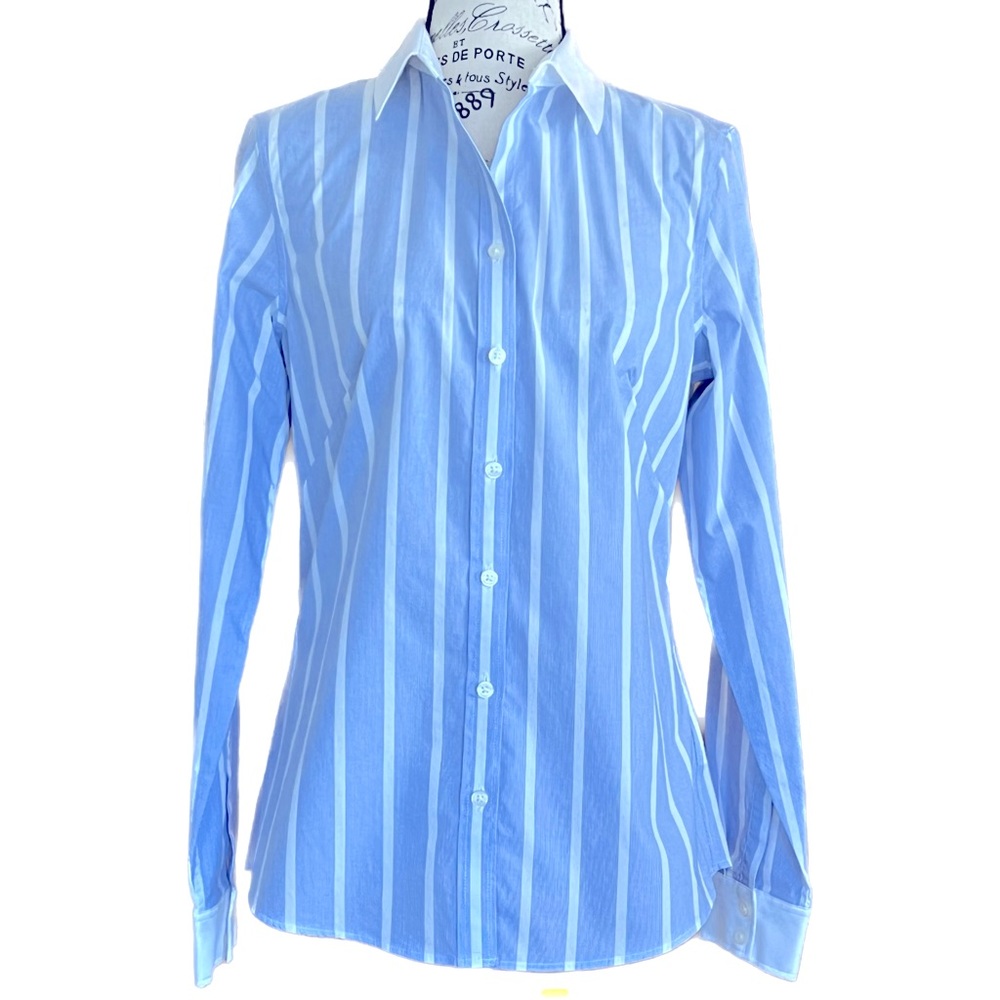 Blue button down ladies’ blouse with contrasting collar and cuffs. Fitted.